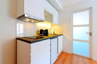 Cuisine ou kitchenette dans l'établissement URBAIN et ZEN - Cosy l Hyper-Centre l Jean Macé by Dreamy Flat Lyon