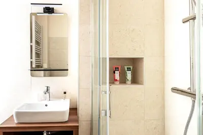 Salle de bains dans l'établissement Hôtel Tête d'or