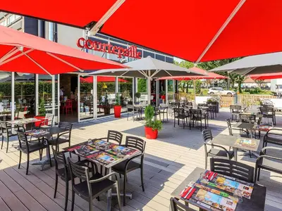 Restaurant ou autre lieu de restauration dans l'établissement Ibis Lyon Villefranche Sur Saone