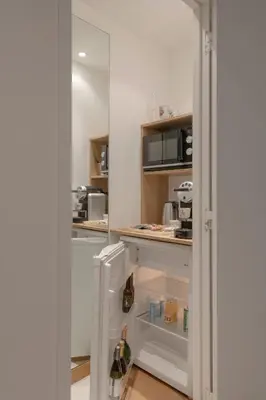 Cuisine ou kitchenette dans l'établissement MiHotel Le Gourguillon