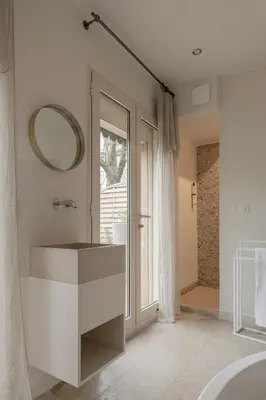 Un ou plusieurs lits dans un hébergement de l'établissement MiHotel Le Gourguillon