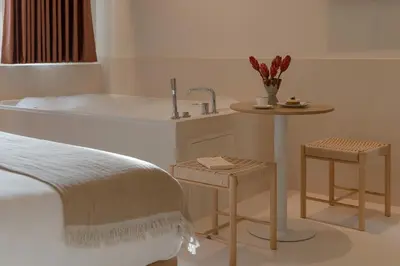 Un ou plusieurs lits dans un hébergement de l'établissement MiHotel Le Gourguillon