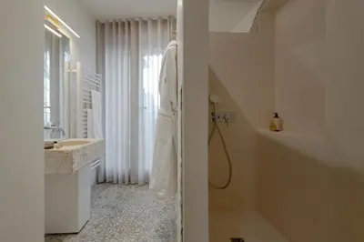 Salle de bains dans l'établissement MiHotel Le Gourguillon