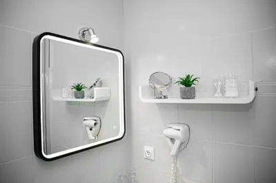 Salle de bains dans l'établissement HOTEL DES DAUPHINS