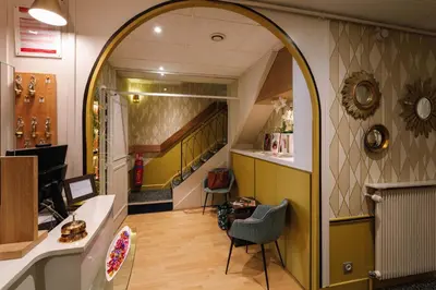 Coin salon dans l'établissement Hôtel du Dauphin