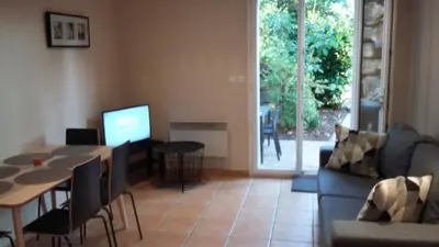 Coin salon dans l'établissement Appartement dans propriété calme en pleine nature