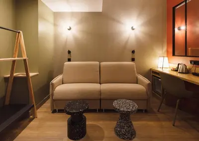 Coin salon dans l'établissement Hôtel de Noailles