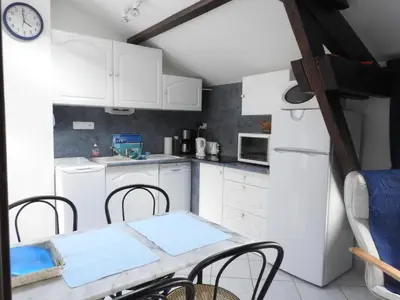 Cuisine ou kitchenette dans l'établissement La Charmatière
