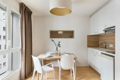 Cuisine ou kitchenette dans l'établissement Appart hôtel Q7 Lodge Lyon 7