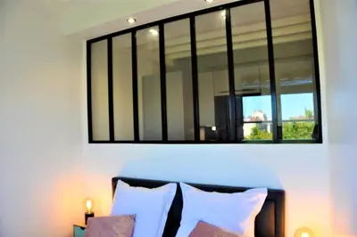 Un ou plusieurs lits dans un hébergement de l'établissement Le Central Rhône 2 - vue grandiose -