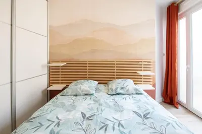 Un ou plusieurs lits dans un hébergement de l'établissement Le Hirvi - cocon zen et épuré à 10min Vieux Lyon