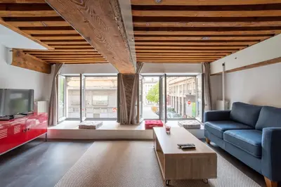 Coin salon dans l'établissement GuestReady - Le Duplex des pentes