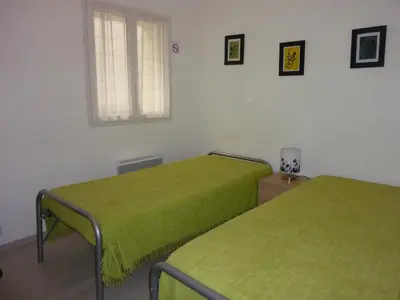 Un ou plusieurs lits dans un hébergement de l'établissement Gîte du Tilleul