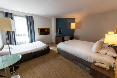 Un ou plusieurs lits dans un hébergement de l'établissement Holiday Inn Lyon Vaise by IHG