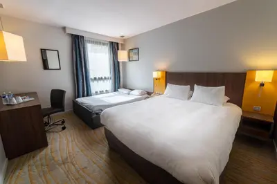 Un ou plusieurs lits dans un hébergement de l'établissement Holiday Inn Lyon Vaise by IHG