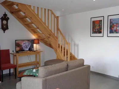 Coin salon dans l'établissement Maison cosy avec jardin dans les Monts du Lyonnais - FR-1-496-174