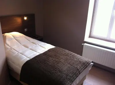 Un ou plusieurs lits dans un hébergement de l'établissement Le Relais des Bergers