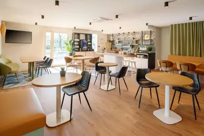 Coin salon dans l'établissement Best Western Bourgoin Jallieu