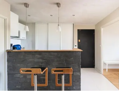 Cuisine ou kitchenette dans l'établissement Le Saint-Irénée