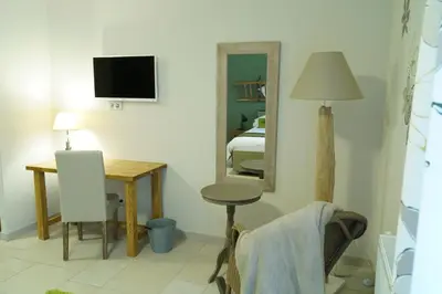 Télévision ou salle de divertissement dans l'établissement Chambres d'hôtes La Leva