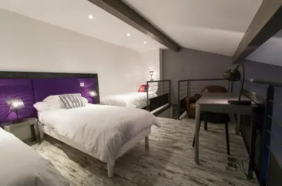 Un ou plusieurs lits dans un hébergement de l'établissement Chambres d'hôtes La Leva