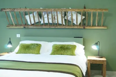 Un ou plusieurs lits dans un hébergement de l'établissement Chambres d'hôtes La Leva