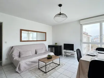 Coin salon dans l'établissement casa Lyon Appartement lumineaux