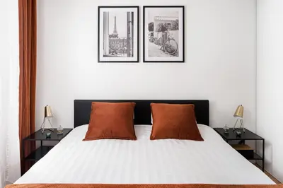 Un ou plusieurs lits dans un hébergement de l'établissement casa Lyon Appartement lumineaux