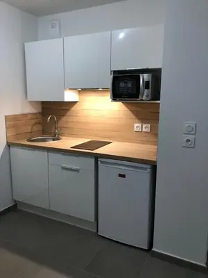 Cuisine ou kitchenette dans l'établissement Appartement avec Balcon Immeuble Standing