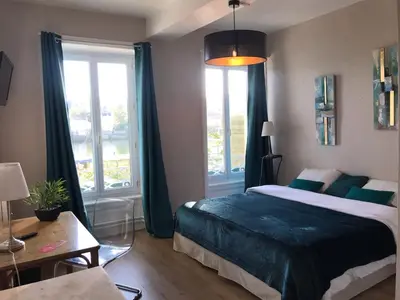 Un ou plusieurs lits dans un hébergement de l'établissement Ô Petit Nice