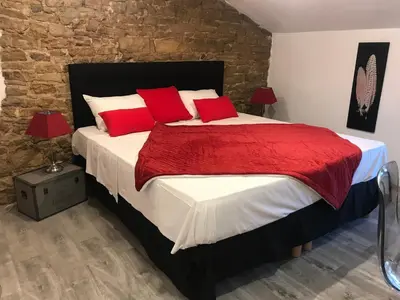 Un ou plusieurs lits dans un hébergement de l'établissement Ô Petit Nice
