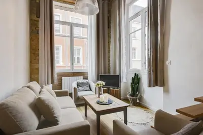 Coin salon dans l'établissement GuestReady - Magnificent duplex canut hypercentre