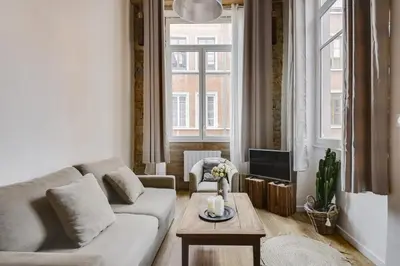 Coin salon dans l'établissement GuestReady - Magnificent duplex canut hypercentre