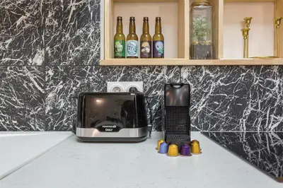Cuisine ou kitchenette dans l'établissement Cocon Cordeliers 2 ou 4 voyageurs