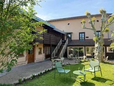 Jardin de l'établissement Hôtel Au Coq Dort Spa