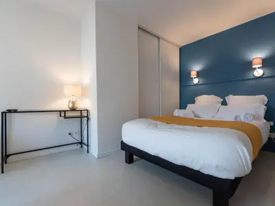 Un ou plusieurs lits dans un hébergement de l'établissement Duplex coquet avec PARKING proche centre-ville de Lyon