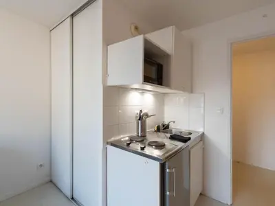 Cuisine ou kitchenette dans l'établissement Duplex coquet avec PARKING proche centre-ville de Lyon