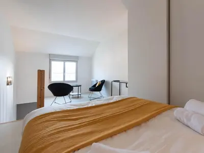 Un ou plusieurs lits dans un hébergement de l'établissement Duplex coquet avec PARKING proche centre-ville de Lyon