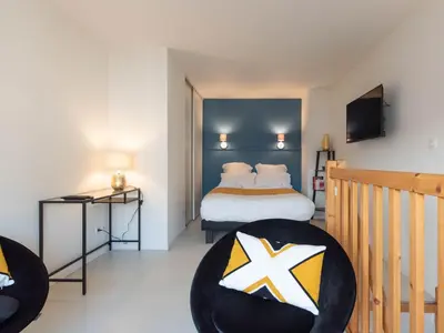 Un ou plusieurs lits dans un hébergement de l'établissement Duplex coquet avec PARKING proche centre-ville de Lyon