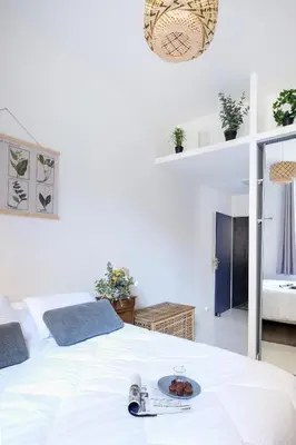 Un ou plusieurs lits dans un hébergement de l'établissement trendy flat-lyon centre-hotel de ville