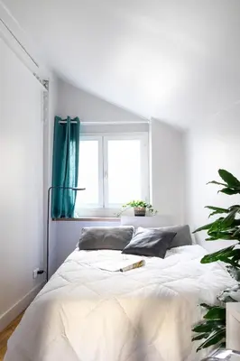 Un ou plusieurs lits dans un hébergement de l'établissement trendy flat-lyon centre-hotel de ville
