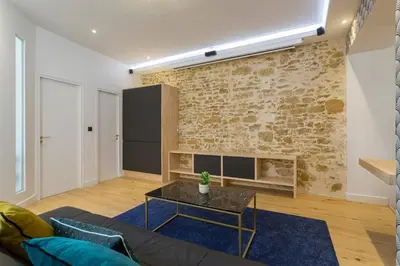 Coin salon dans l'établissement Hamac Suites - Lyon le Bellecour
