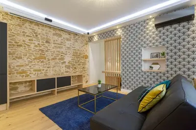 Coin salon dans l'établissement Hamac Suites - Lyon le Bellecour
