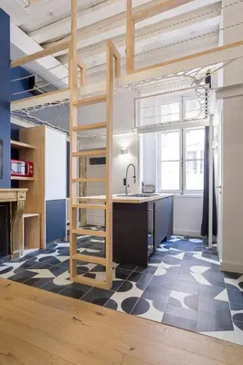 Cuisine ou kitchenette dans l'établissement Hamac Suites - Lyon le Bellecour