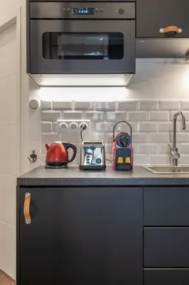 Cuisine ou kitchenette dans l'établissement Le Cocon Lita-Palace