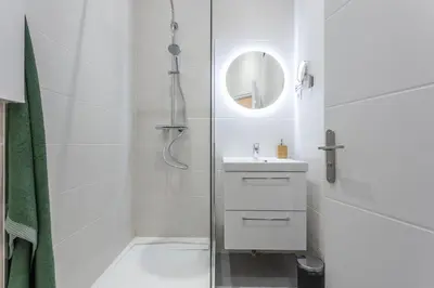 Salle de bains dans l'établissement Le Cocon Lita-Palace