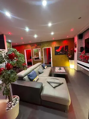 Coin salon dans l'établissement Lovelove23spas