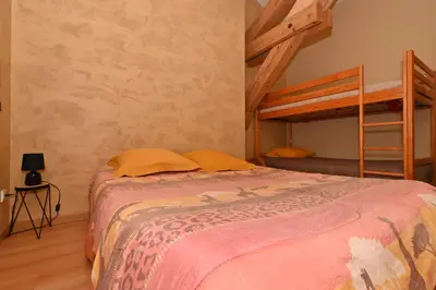 Un ou plusieurs lits dans un hébergement de l'établissement LES CHAMBRES DE L'OUEST