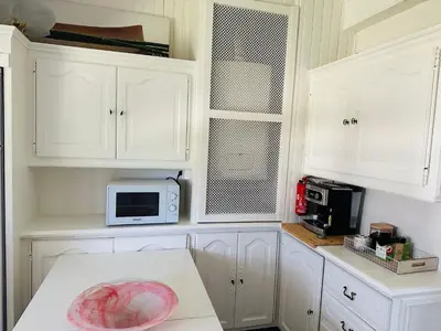Cuisine ou kitchenette dans l'établissement Grand appartement Bron centre proche Eurexpo et Groupama