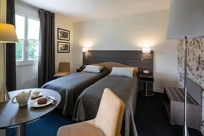 Un ou plusieurs lits dans un hébergement de l'établissement Le Cottage de Clairefontaine